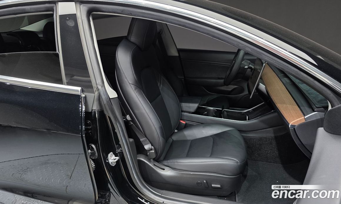 Tesla Model 3 фото 11