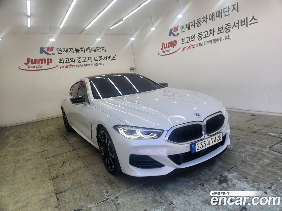 BMW 8-Series (G15) фото 3