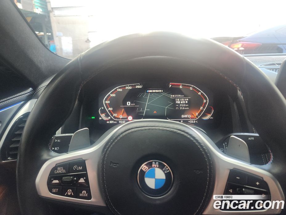 BMW 8-Series (G15) фото 16